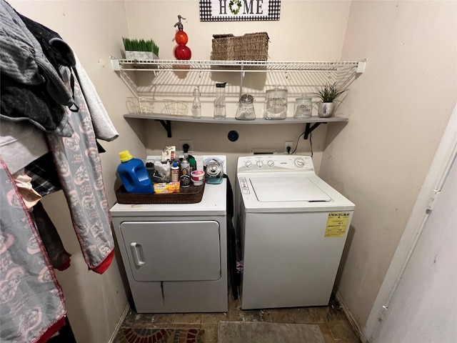 washroom with separate washer and dryer