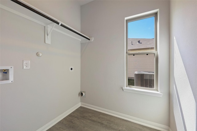 laundry area with gas dryer hookup, dark wood-type flooring, hookup for a washing machine, and electric dryer hookup