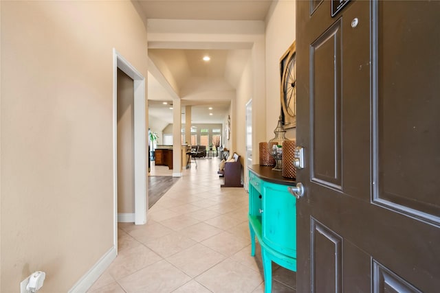 foyer featuring light tile patterned flooring