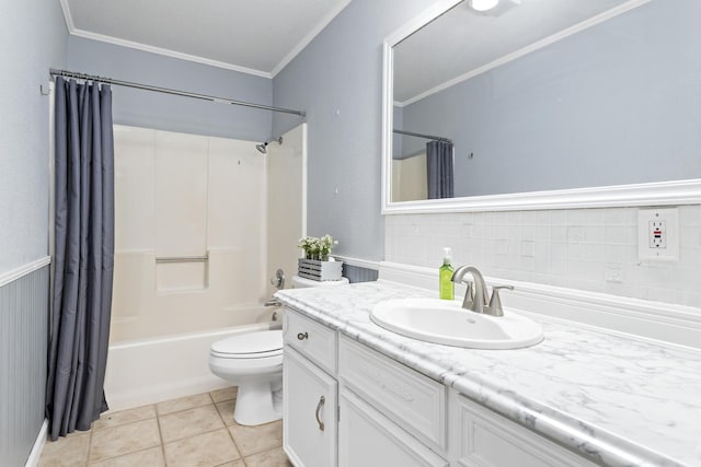 full bathroom featuring toilet, vanity, tile patterned flooring, shower / bathtub combination with curtain, and ornamental molding