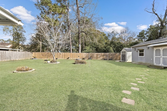 view of yard with a storage unit