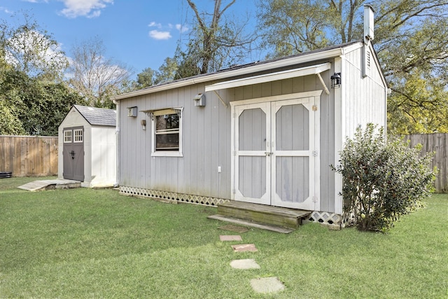 view of outdoor structure featuring a yard