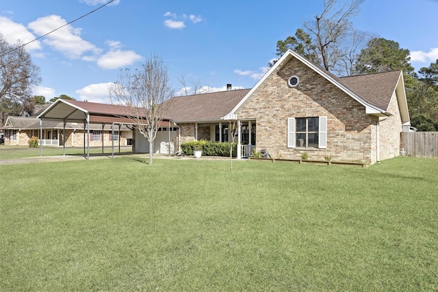 view of front of property with a front lawn and a garage