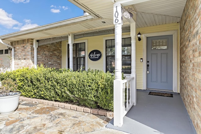 entrance to property with a porch