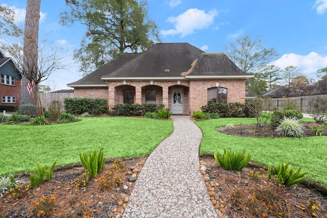 view of front of home with a front yard