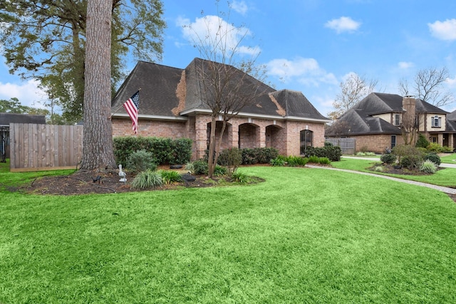 view of front of home with a front yard