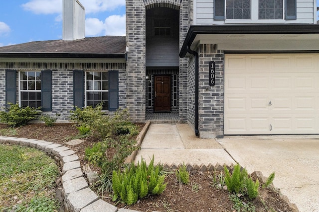 entrance to property featuring a garage