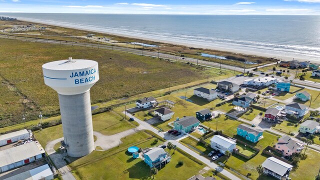 aerial view with a beach view and a water view