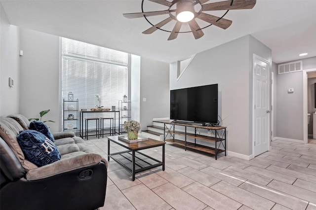 living room featuring ceiling fan