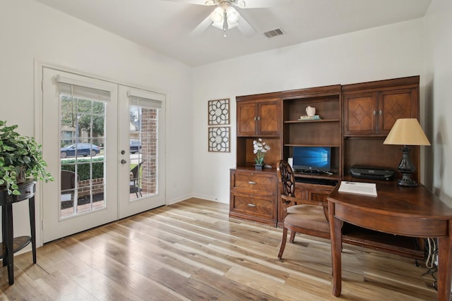 office area featuring ceiling fan, french doors, and light hardwood / wood-style flooring