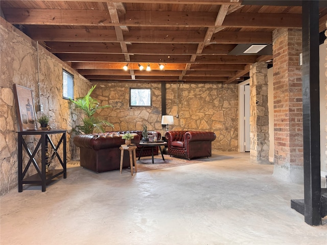 basement featuring wooden ceiling