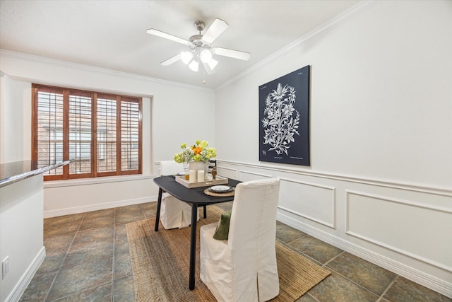 dining area with ceiling fan and ornamental molding