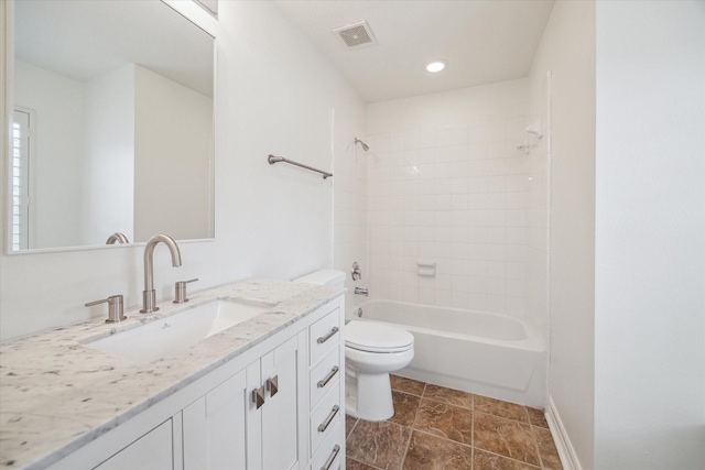 full bathroom featuring toilet, vanity, and shower / washtub combination