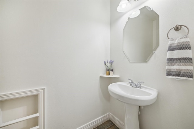 bathroom with tile patterned flooring