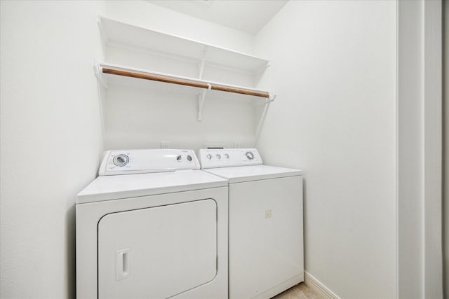 washroom featuring separate washer and dryer