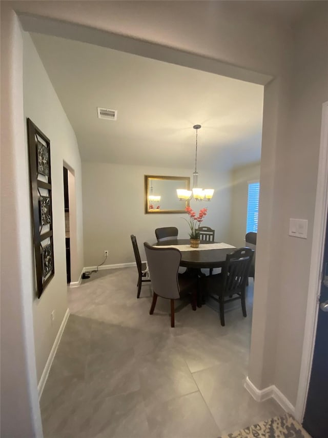 dining room with an inviting chandelier