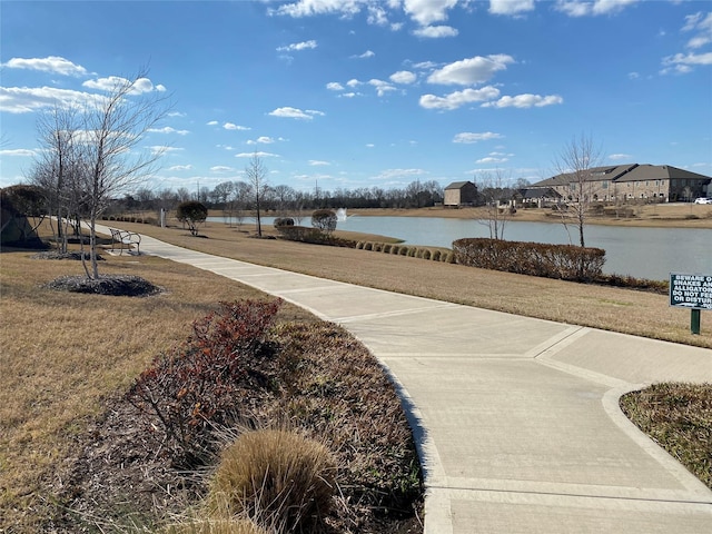 exterior space with a water view