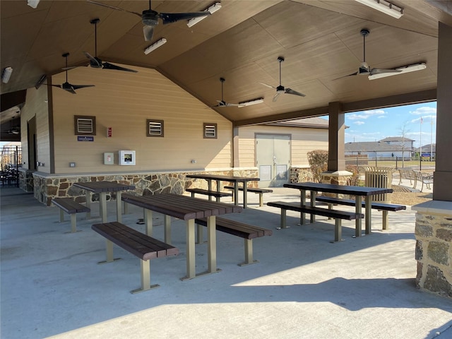 view of patio featuring ceiling fan