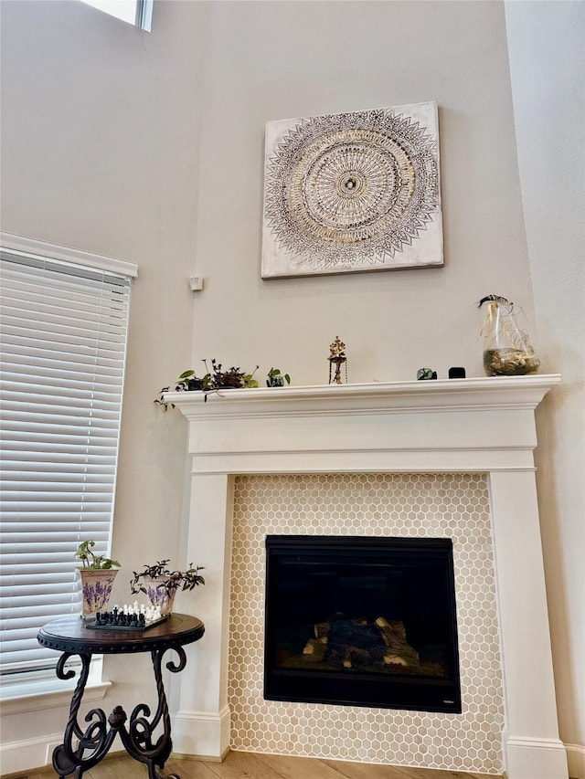 room details featuring a tiled fireplace