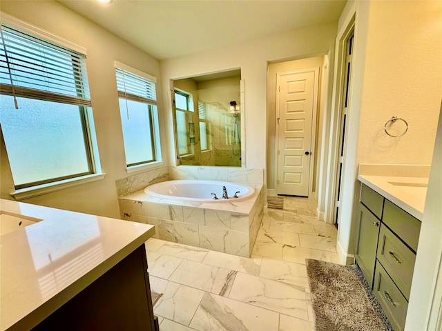 bathroom featuring plus walk in shower and vanity