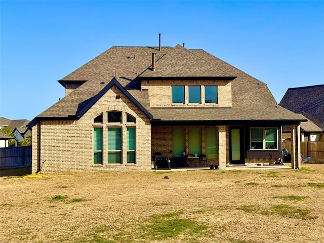 rear view of house with a patio