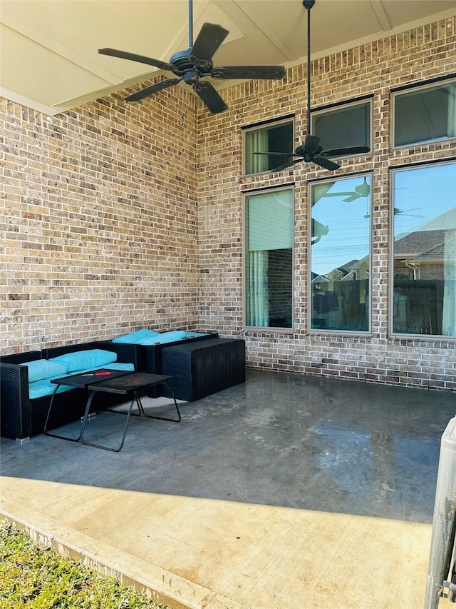 view of patio / terrace featuring ceiling fan