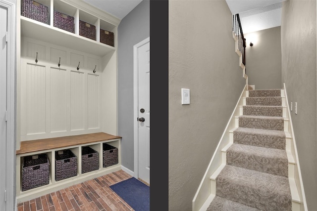 mudroom with dark wood-type flooring