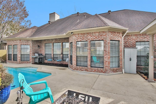 rear view of house featuring a patio area