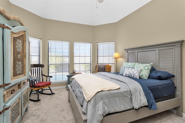 bedroom with light colored carpet