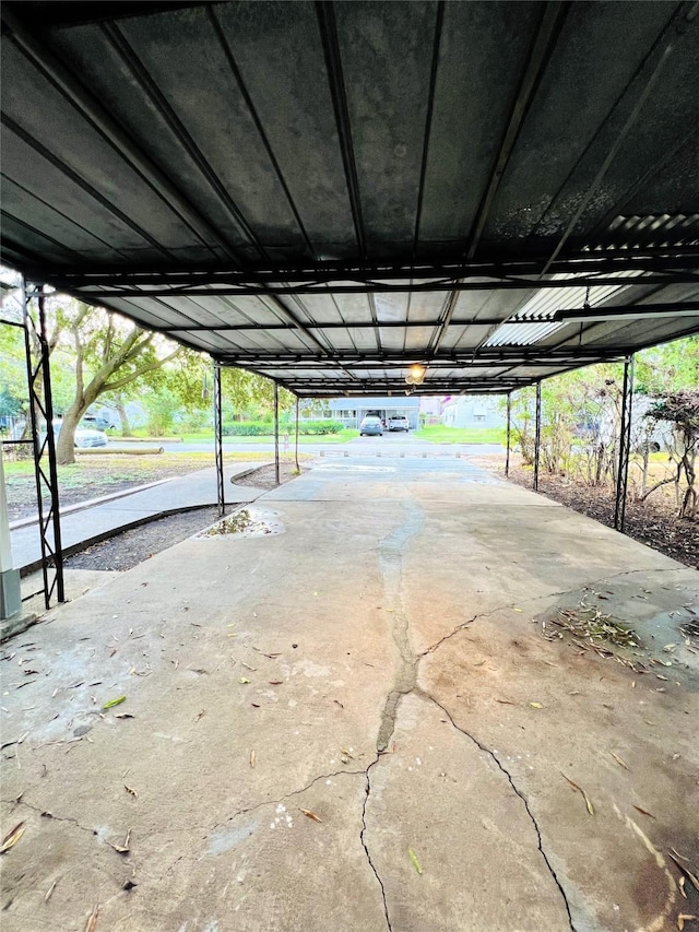 garage featuring a carport