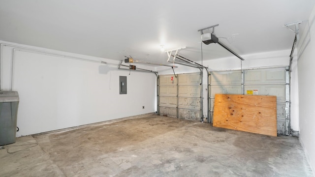 garage featuring a garage door opener and electric panel