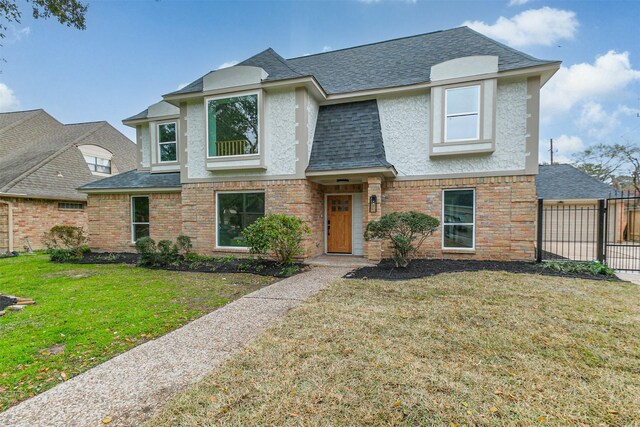 view of front of house with a front lawn