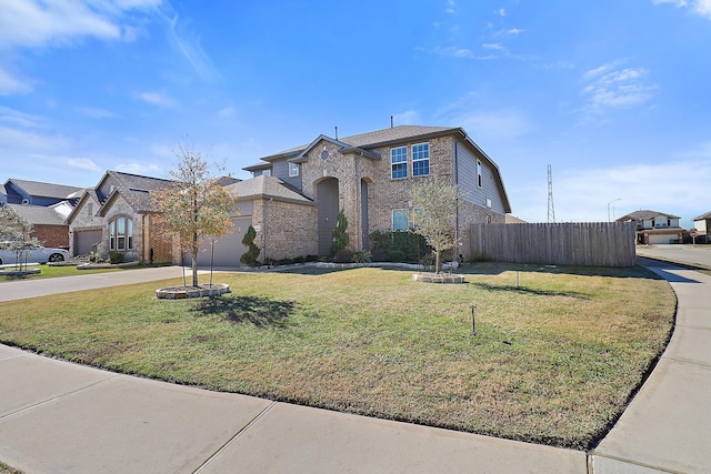 view of front facade featuring a front yard