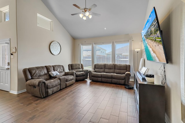 living room featuring lofted ceiling and ceiling fan