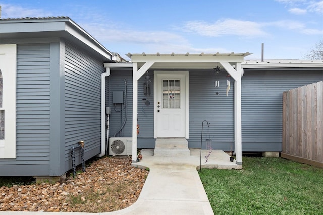 doorway to property featuring ac unit