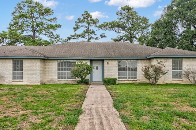 ranch-style house with a front yard