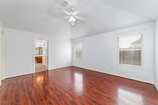 spare room featuring ceiling fan, hardwood / wood-style flooring, and lofted ceiling