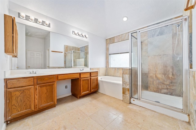 bathroom with plus walk in shower and vanity