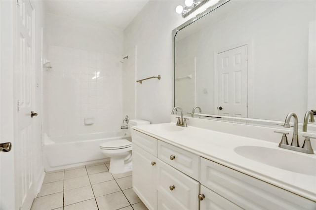 full bathroom featuring toilet, tile patterned floors, vanity, and tiled shower / bath