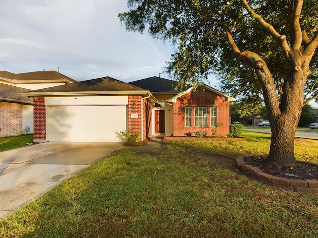 single story home featuring a garage and a front yard