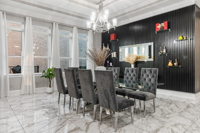 dining room featuring a notable chandelier, a wealth of natural light, and crown molding