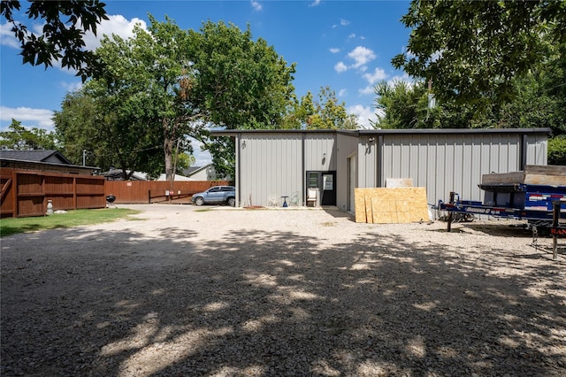 view of outdoor structure with fence