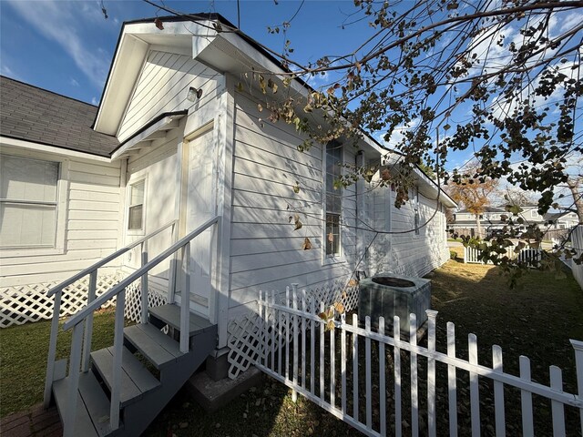 view of home's exterior featuring central air condition unit