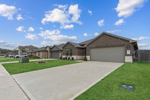 ranch-style house with a garage and a front lawn