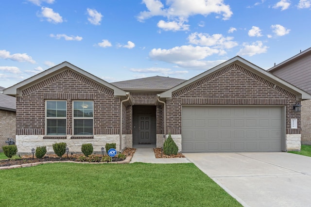 ranch-style house with a garage and a front lawn