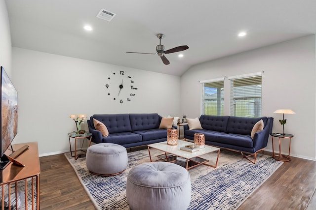 living room with vaulted ceiling, ceiling fan, and dark hardwood / wood-style floors