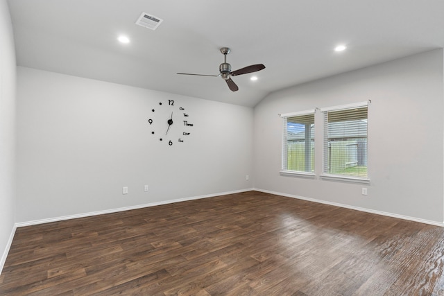 spare room with ceiling fan, dark hardwood / wood-style flooring, and lofted ceiling