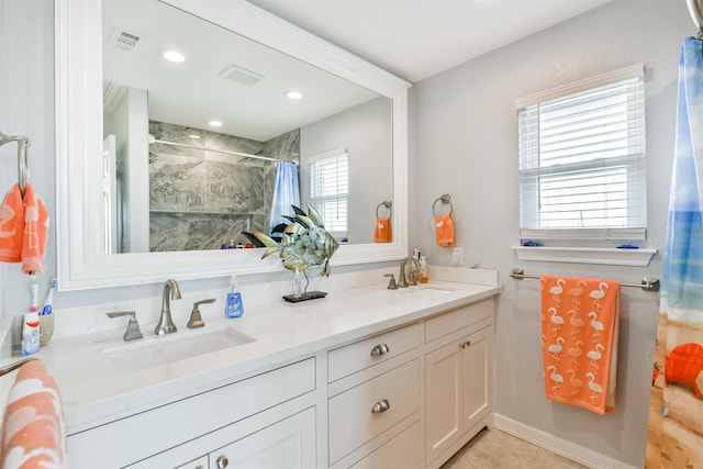 bathroom featuring vanity and a shower with curtain