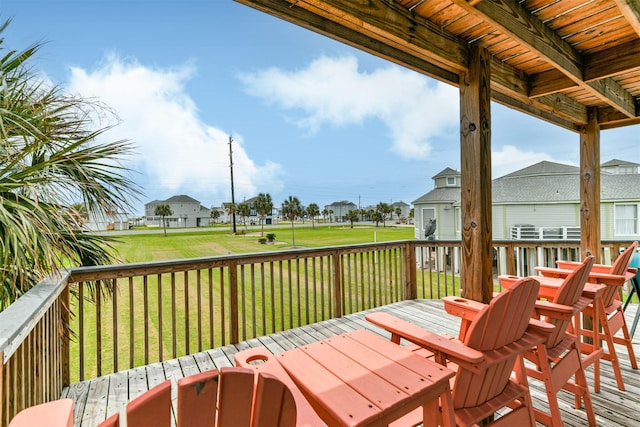 deck featuring a lawn