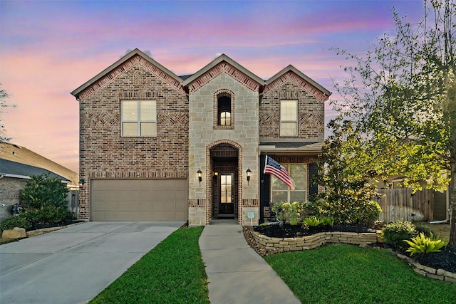 view of front of property featuring a garage